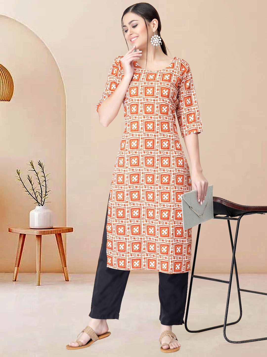 

Moda Rapido Women Printed Regular Kurta with Trousers, Orange