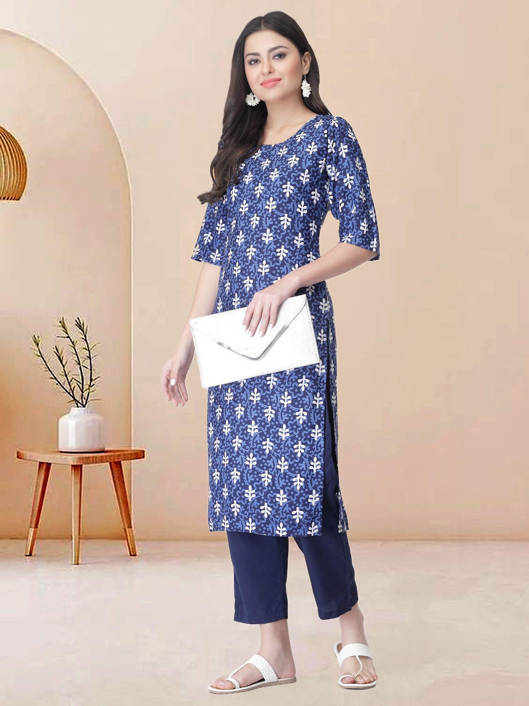 

Moda Rapido Women Ethnic Motifs Printed Regular Kurta with Trousers, Black