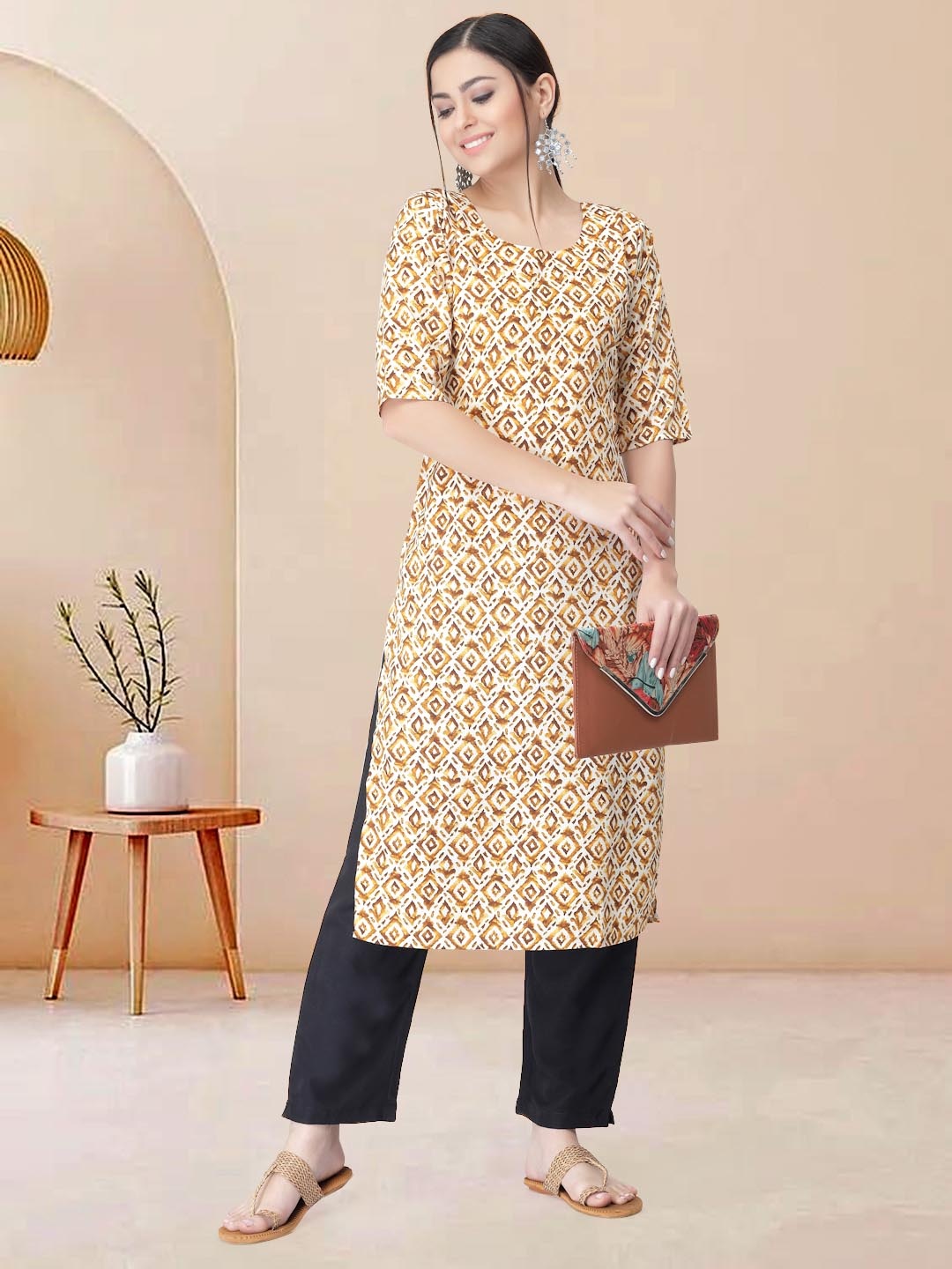 

Moda Rapido Women Ethnic Motifs Printed Regular Kurta with Trousers, Beige
