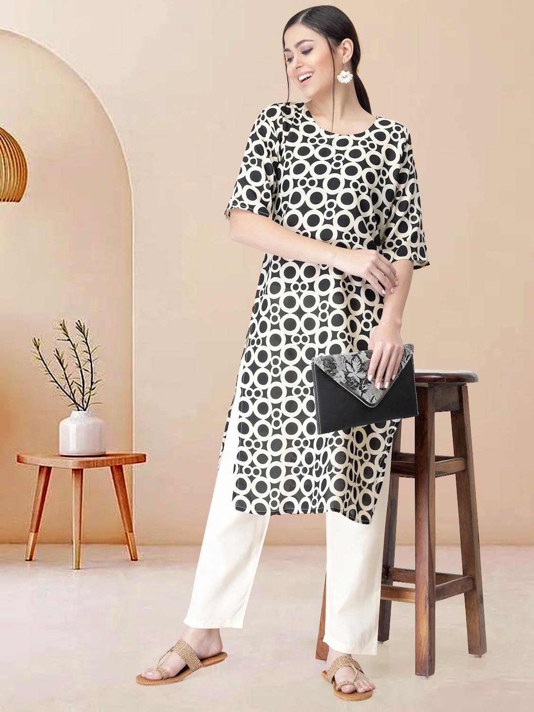 

Moda Rapido Women Ethnic Motifs Printed Regular Kurta with Trousers, Black