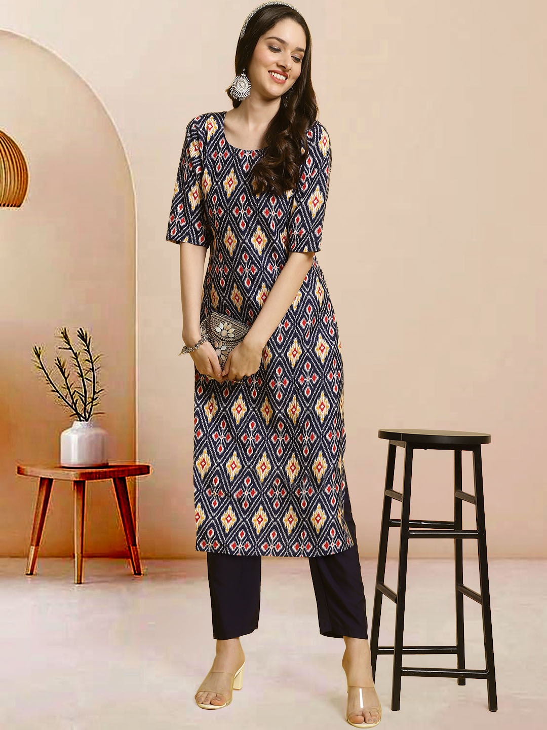 

Moda Rapido Women Ethnic Motifs Printed Regular Kurta with Trousers, Navy blue