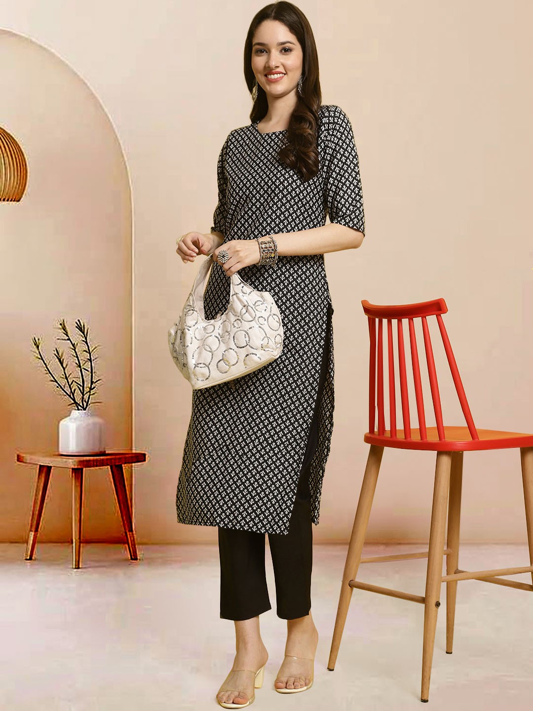 

Moda Rapido Women Ethnic Motifs Printed Regular Kurta with Trousers, Black
