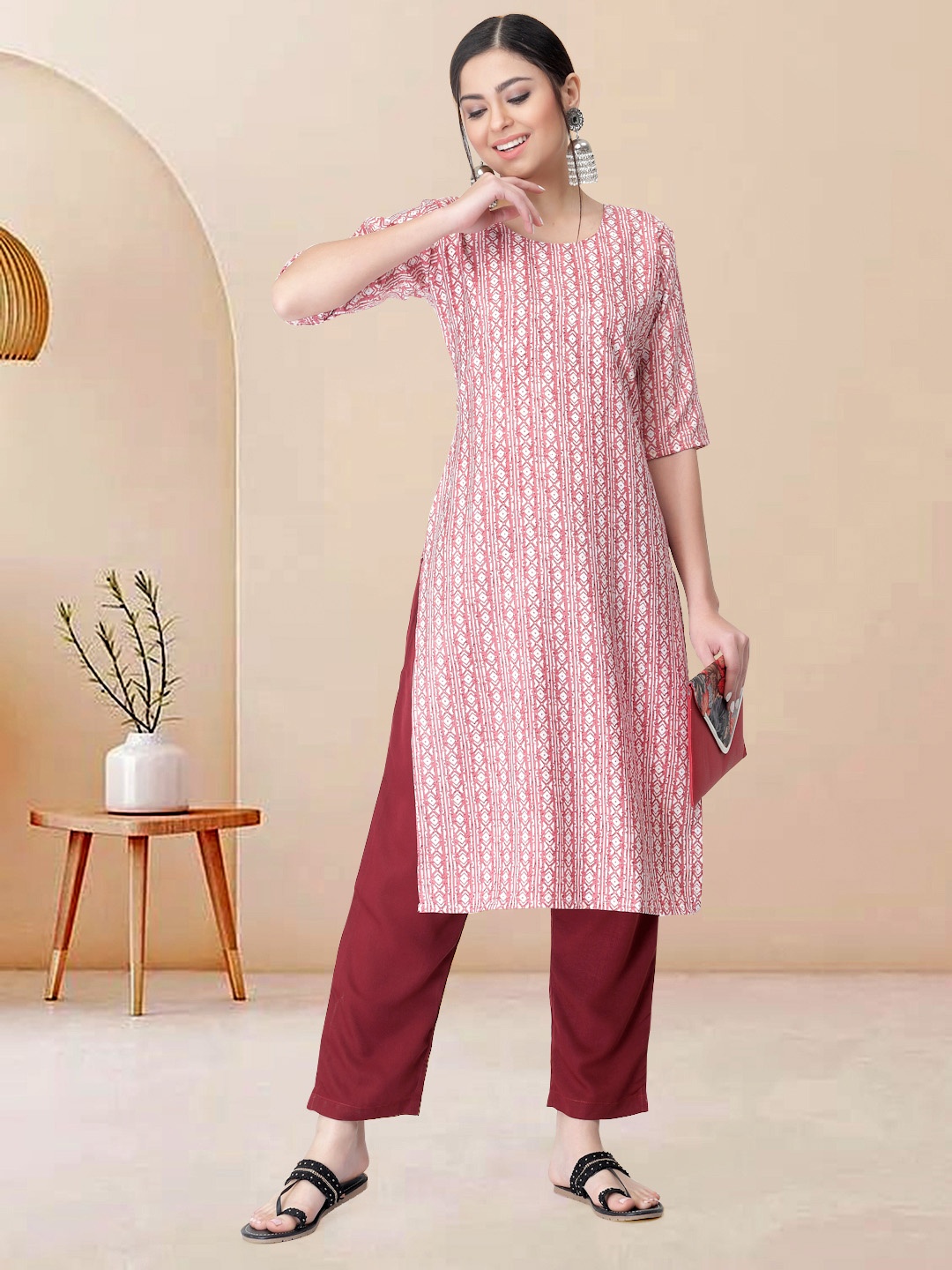 

Moda Rapido Women Ethnic Motifs Printed Regular Kurta with Trousers, Peach