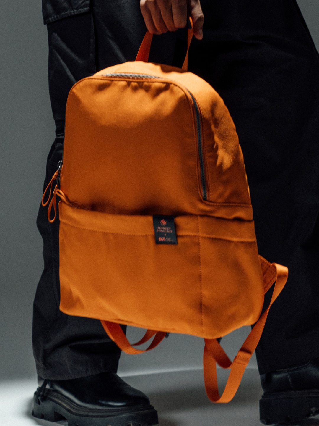 

DailyObjects Structured Handheld Bag, Orange
