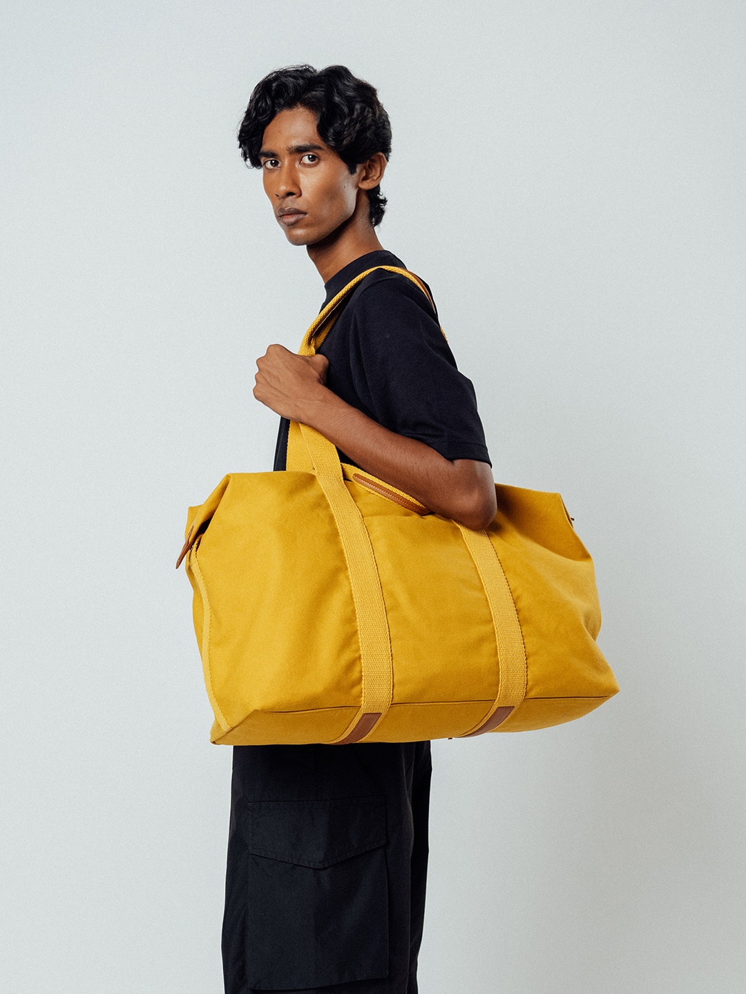 

DailyObjects Structured Handheld Bag, Yellow