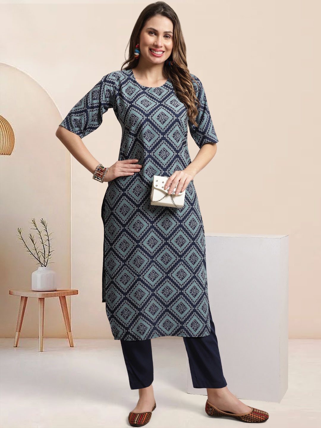 

Moda Rapido Women Ethnic Motifs Printed Regular Kurta with Trousers, Blue