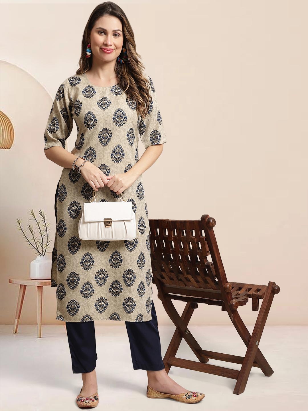 

Moda Rapido Women Floral Printed Regular Kurta with Trousers, Cream