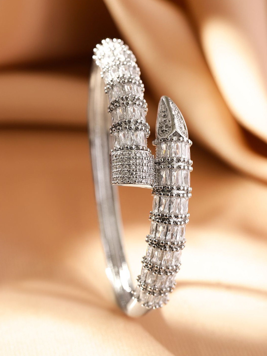 

Rubans Rhodium Plated Baguette Cut Cubic Zirconia Openable Serphant Bracelet, Silver