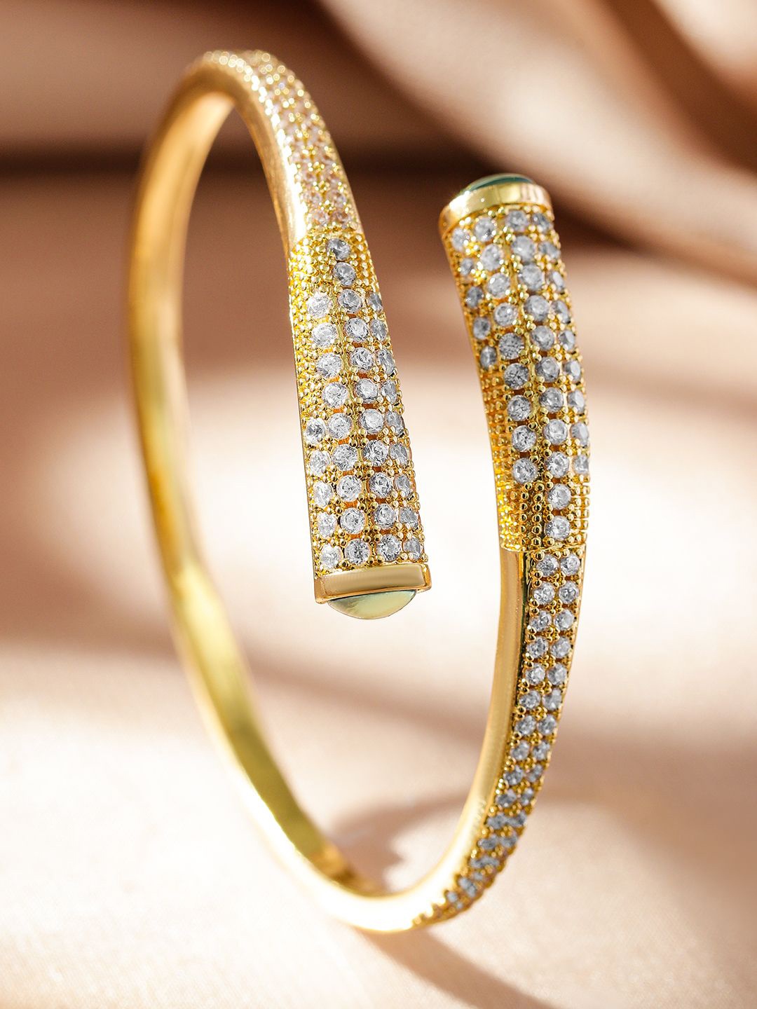 

Rubans Voguish 22K Gold Plated Open Cuff Bracelet with Cubic Zirconia and Green Gemstone