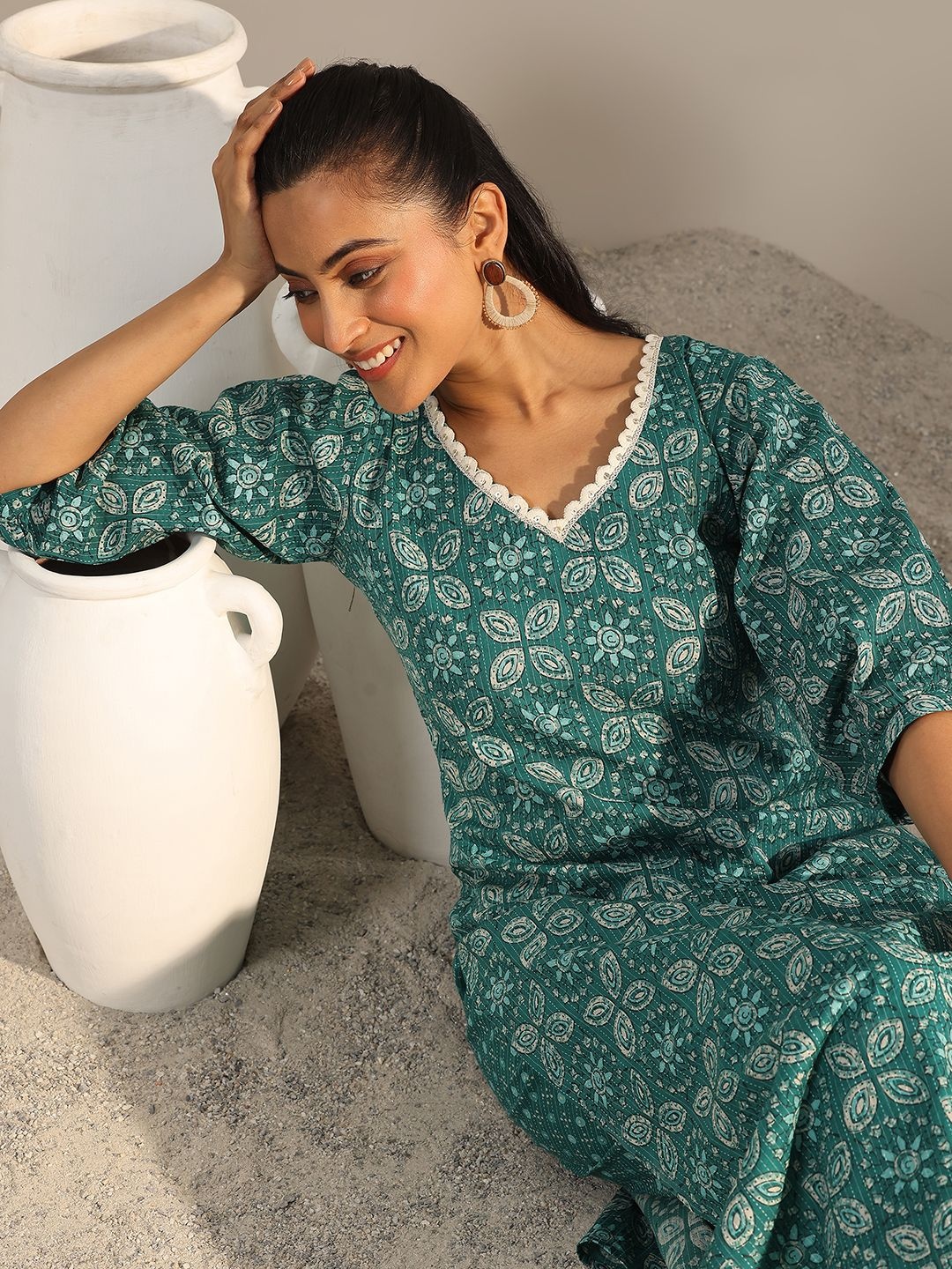 

Libas Teal Blue Floral Printed V-Neck Puffed Sleeves Straight Kurta With Trousers