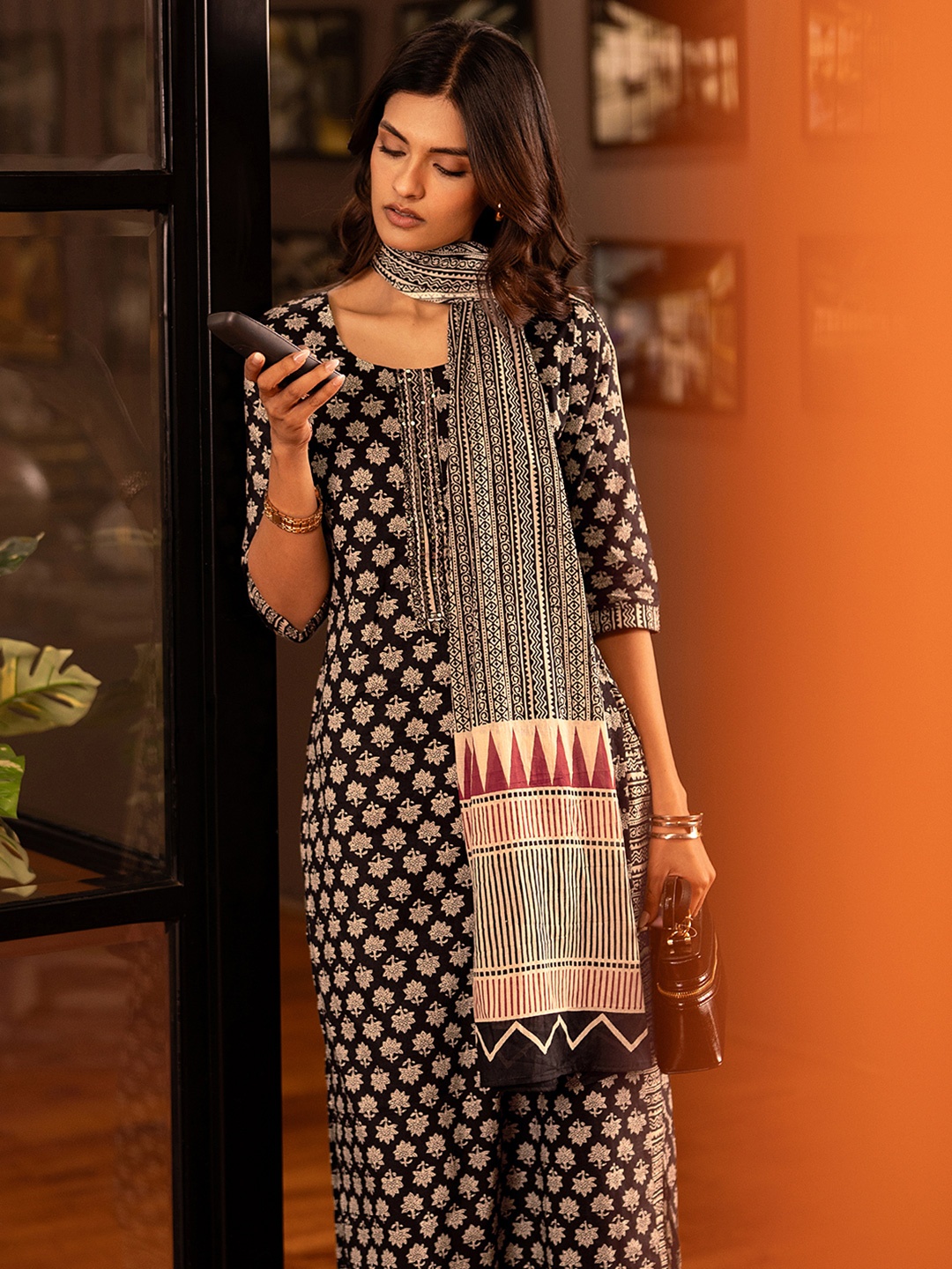 

Libas Black Floral Ajrakh Printed Round Neck Straight Kurta With Trouser And Dupatta