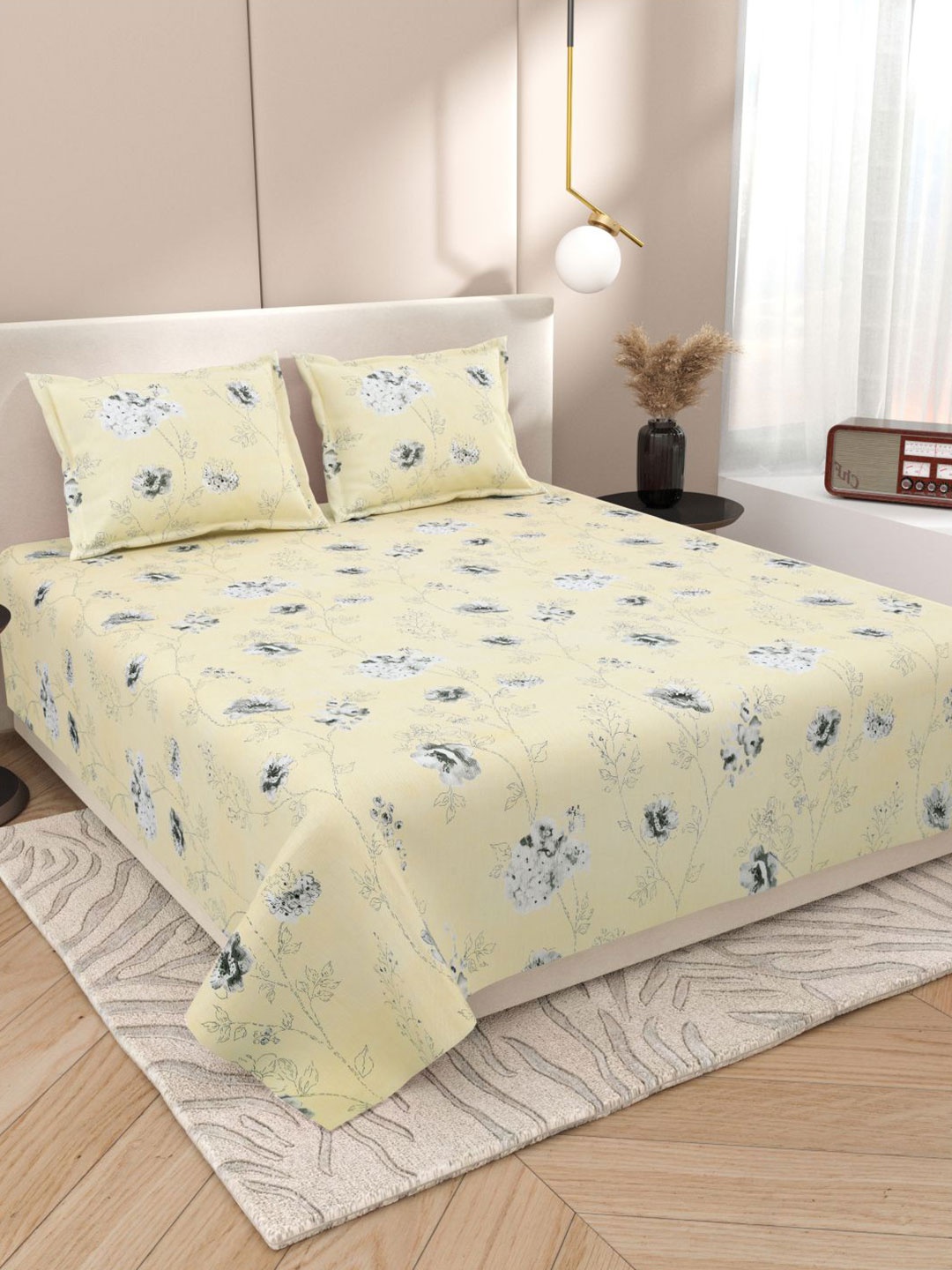 

DREAM WEAVERZ Yellow & Grey Floral Printed 220 TC King Bedsheet Set 2.75m X 2.55m