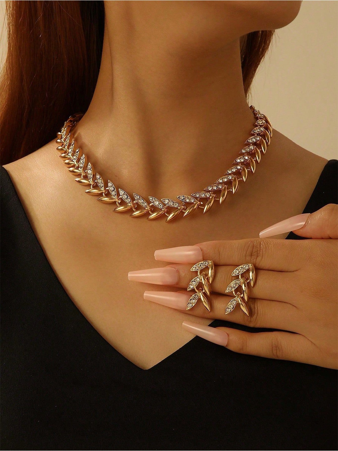 

Shining Diva Fashion Gold-Plated Crystals Studded Jewellery Set