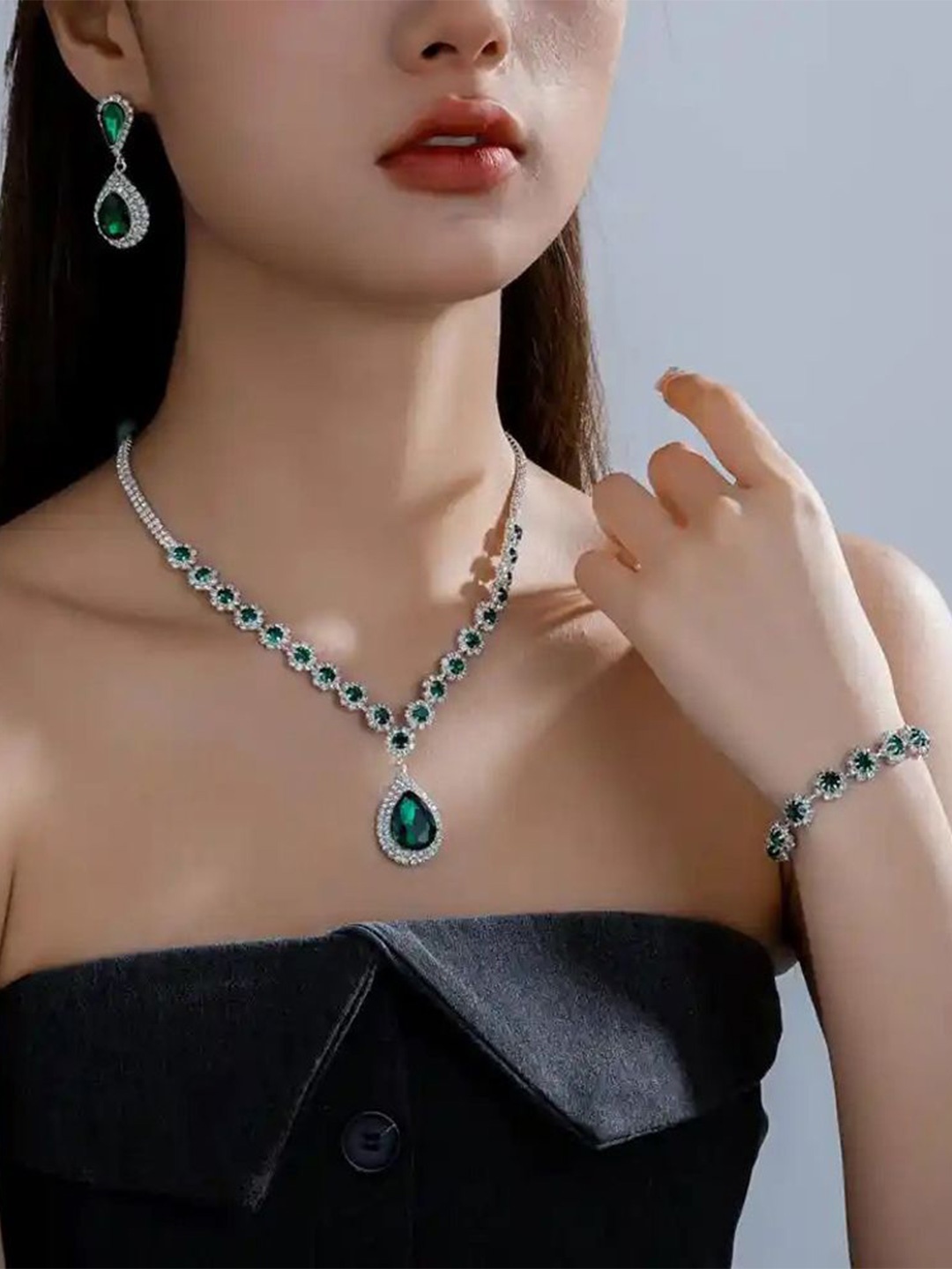 

Shining Diva Fashion Sliver Plated Artificial Stone Studded Jewellery Set, Green