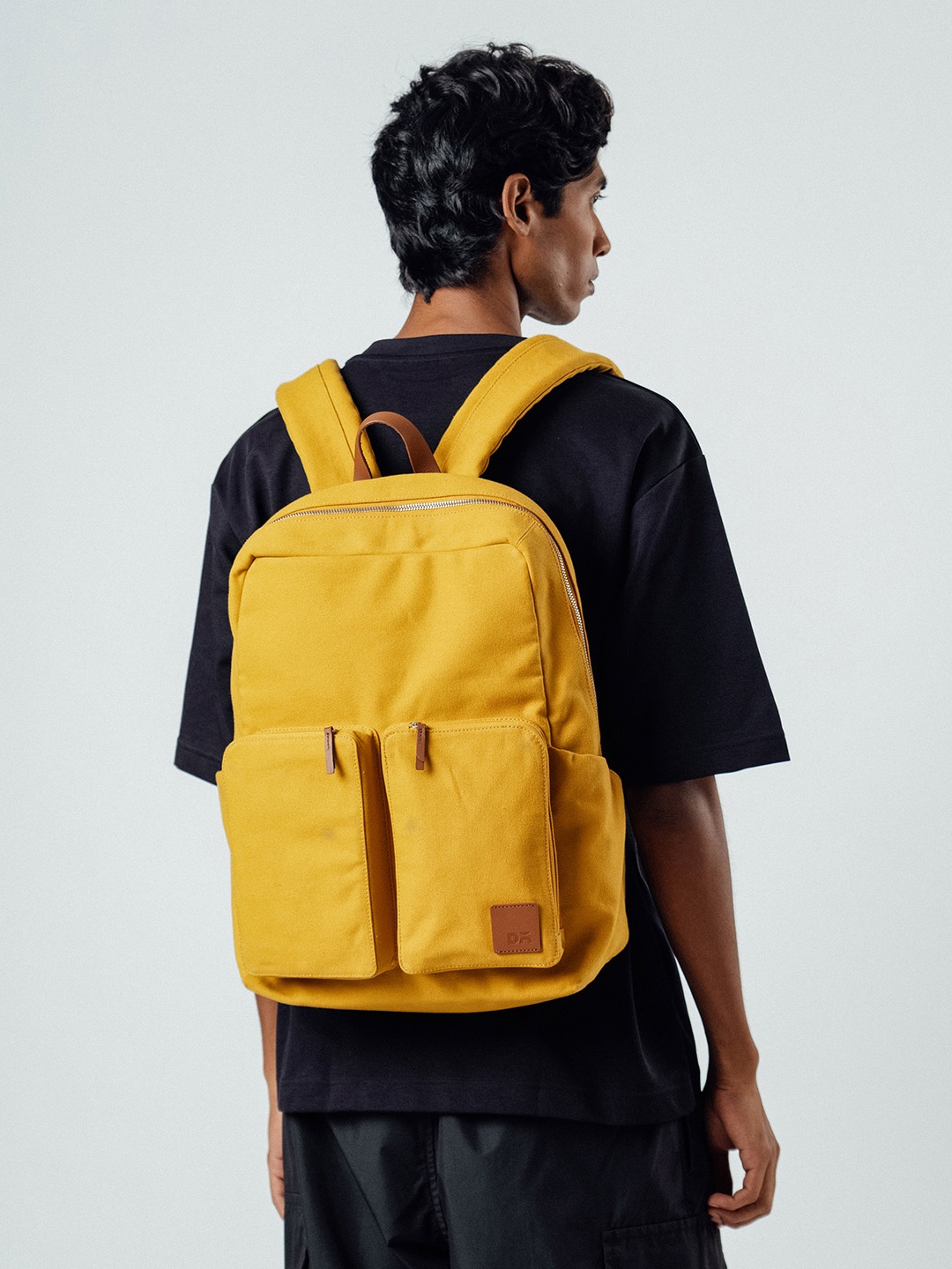 

DailyObjects Unisex Solid Backpack, Mustard