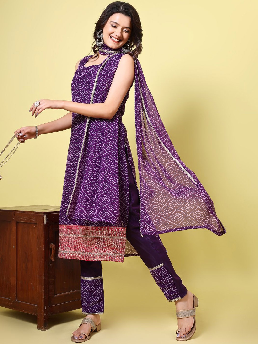 

Sangria Purple Bandhani Printed Square Neck Georgette Kurta With Trousers & Dupatta