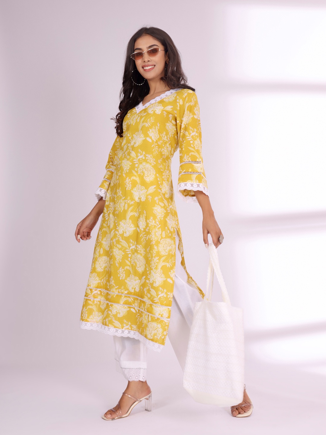 

Varanga Floral Printed V-Neck Pure Cotton Straight Kurta, Yellow