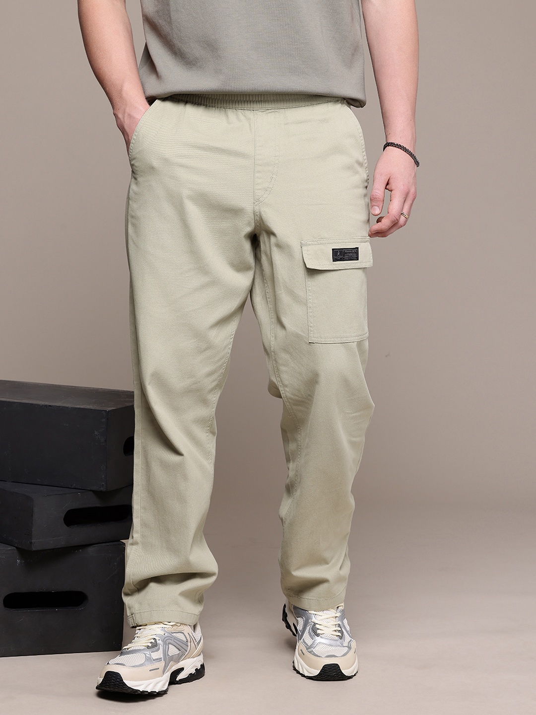 

The Roadster Lifestyle Co. Men Relaxed Pure Cotton Loose Fit Trousers, Beige