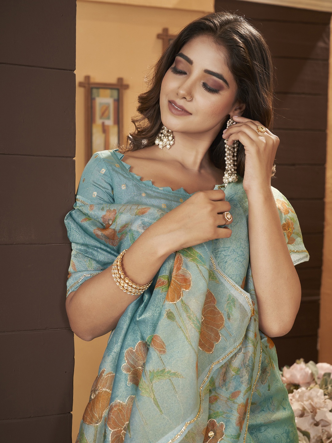 

Ethnielle Floral Printed Beads and Stones Tissue Saree, Turquoise blue