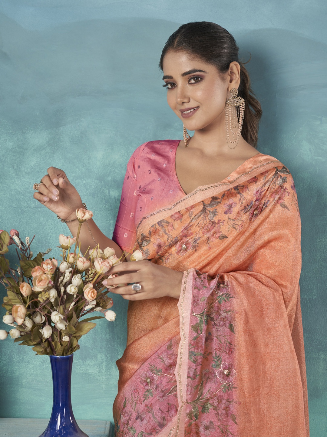 

Ethnielle Floral Printed Tissue Saree, Orange