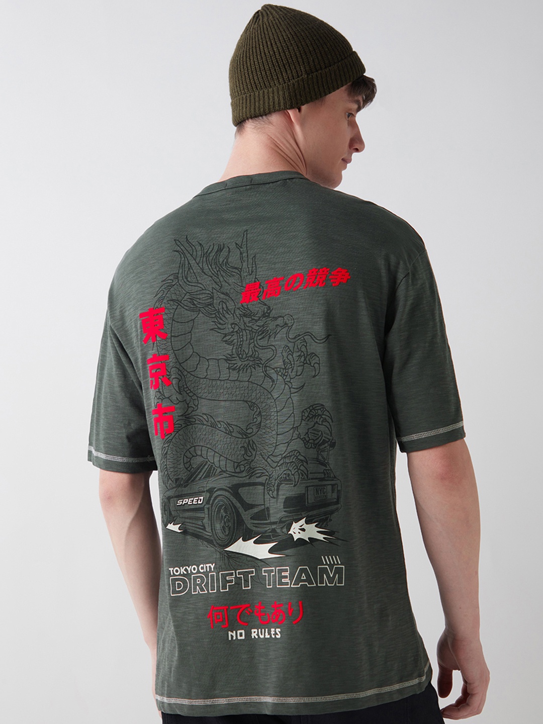 

Bewakoof AIR Men Air 1.0 Typography Printed Round Neck Cotton Oversized T-shirt, Olive