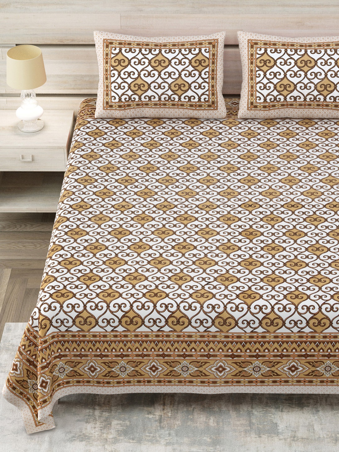 

Aapno Rajasthan Yellow Printed 144 TC Pure Cotton King Bedsheet Set 2.74m x 2.74m
