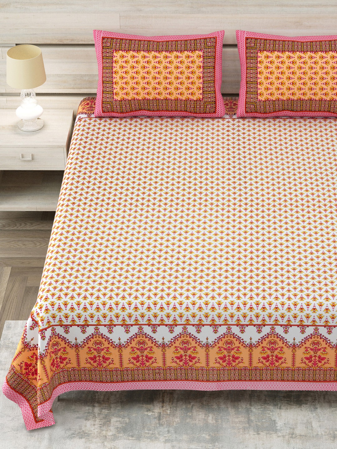 

Aapno Rajasthan Orange Floral Printed Cotton 144 TC King Bedsheet Set 2.74m x 2.74m