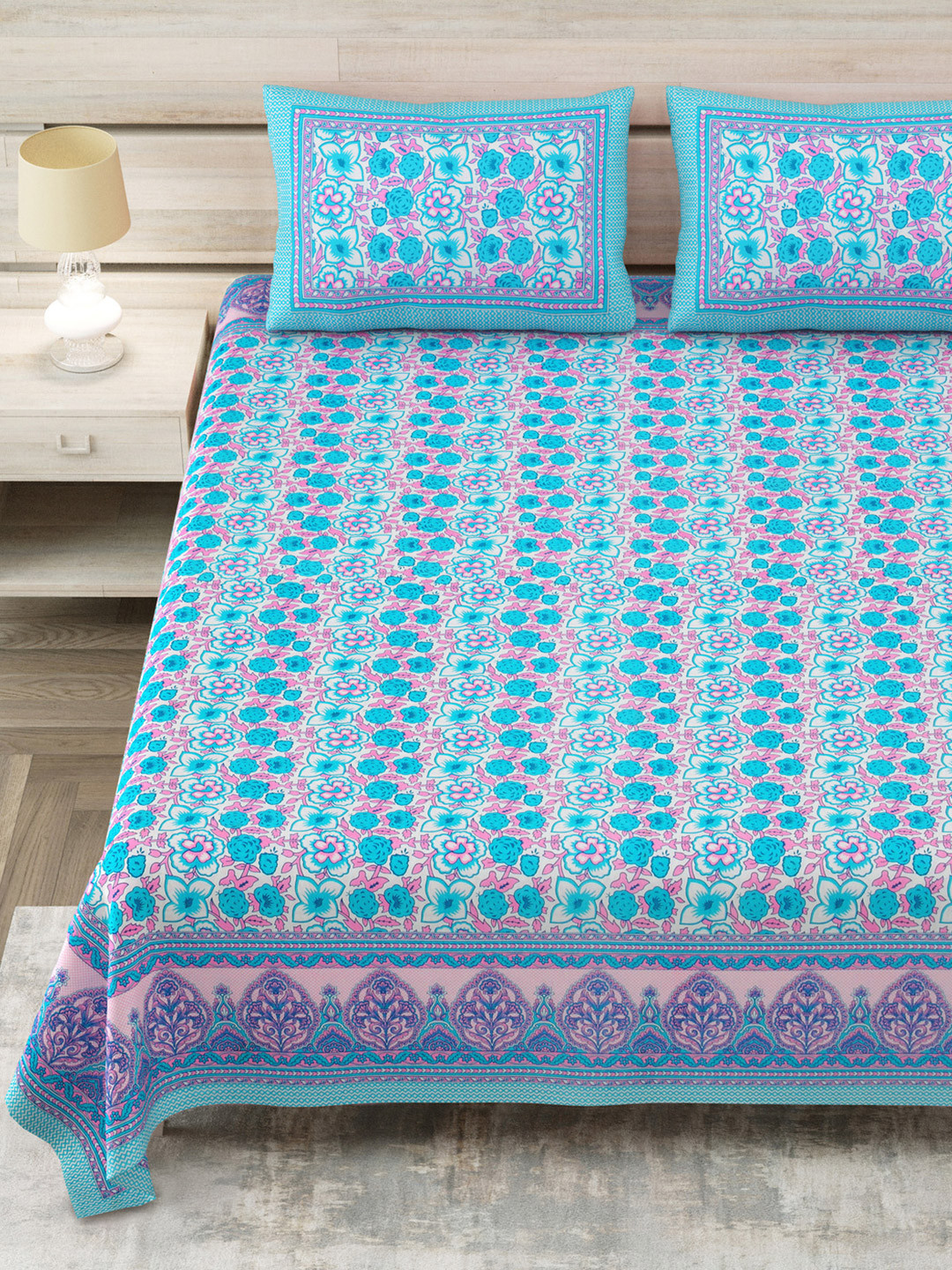 

Aapno Rajasthan Blue & Pink Floral Printed Cotton 144 TC King Bedsheet Set 2.74m x 2.74m