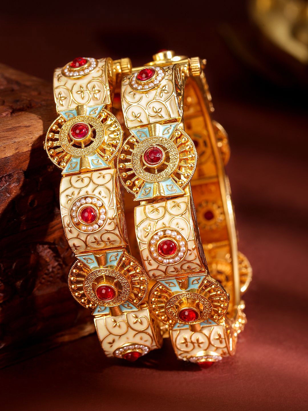 

Rubans Set of 2 22K Gold Plated Bangles with Red Stones Pearls Blue & Peach Enamel