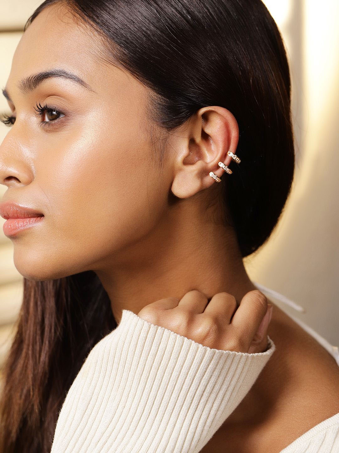 

Rubans Voguish 18K Gold Plated Baguette Zirconia Studded Triple Layer Statement Ear Cuff