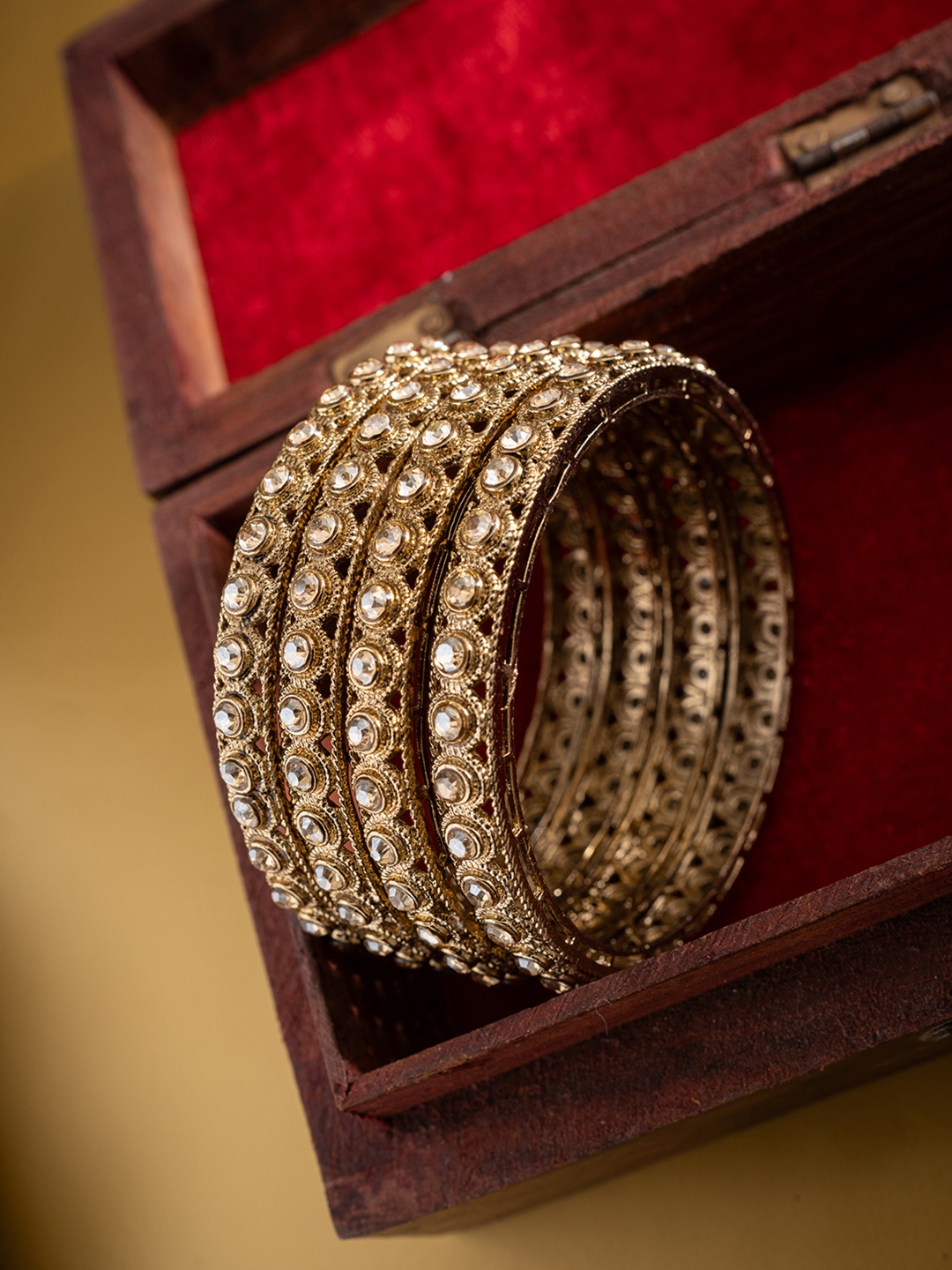 

PANASH Gold-Plated American Diamond Stone-Studded & Beaded Finger Ring