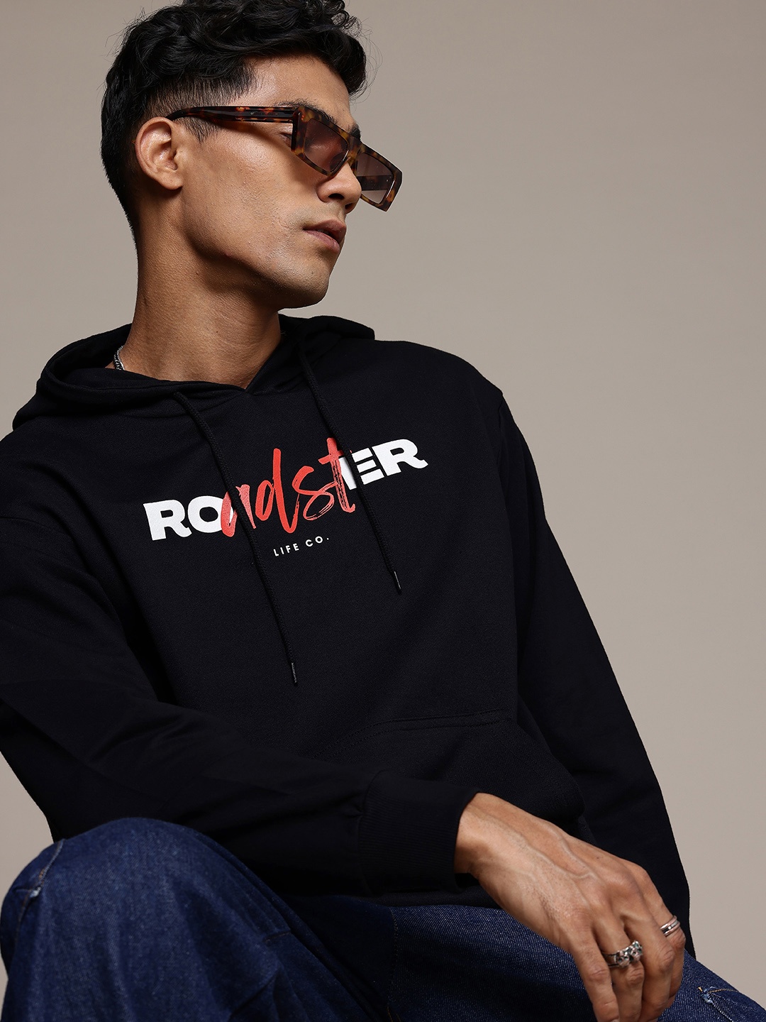 

The Roadster Lifestyle Co. Men Printed Hooded Pure Cotton Sweatshirt, Black