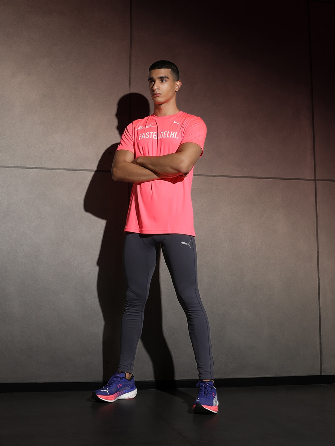 

Puma Vedanta Delhi Half Marathon Men Graphic Printed Running T-Shirt, Pink