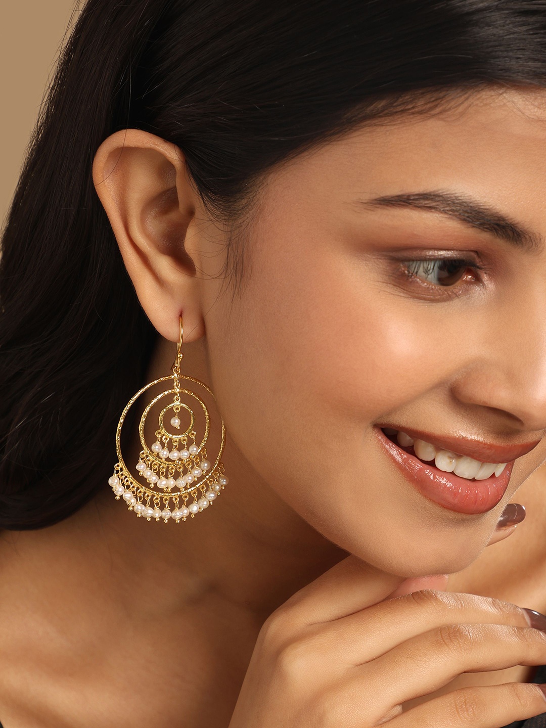 

Yinara Gold-Plated Artificial Beaded Circular Earrings