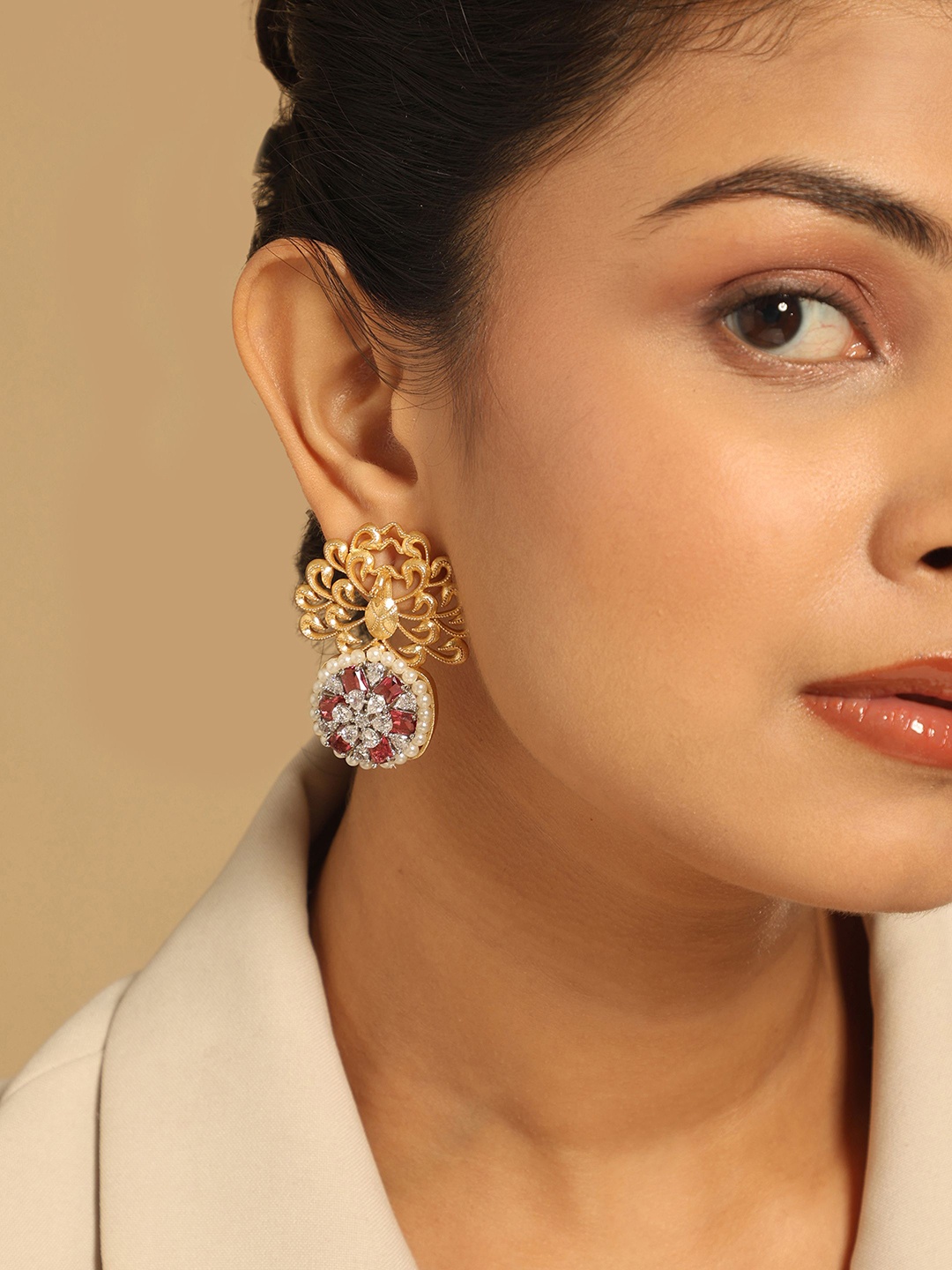 

Yinara Gold-Plated CZ Studded Peacock Shaped Drop Earrings