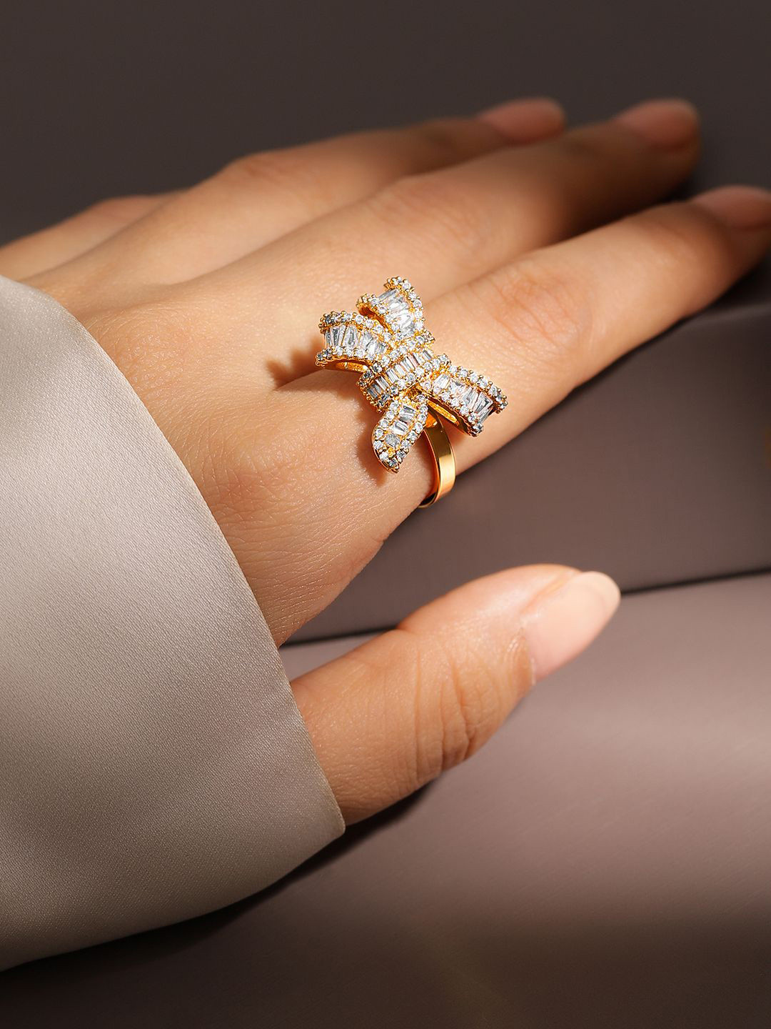 

Rubans 18K Gold Plated Baguette Cut Cubic Zirconia Bow Design Adjustable Statement Ring