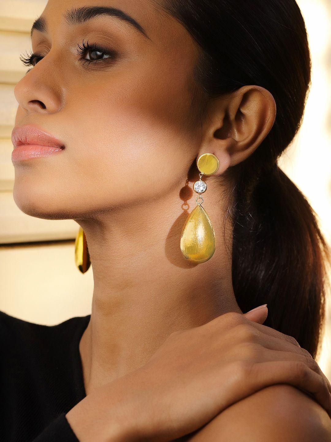 

Rubans Voguish 18K Gold Plated Textured Teardrop Dangle Earrings with Cubic Zirconia
