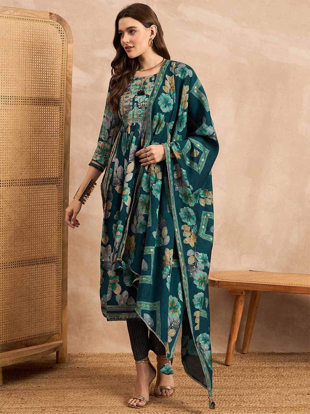 

CHETI Women Floral Printed Pleated Mirror Work Chanderi Silk Kurta with Trousers & With Dupatta, Turquoise blue