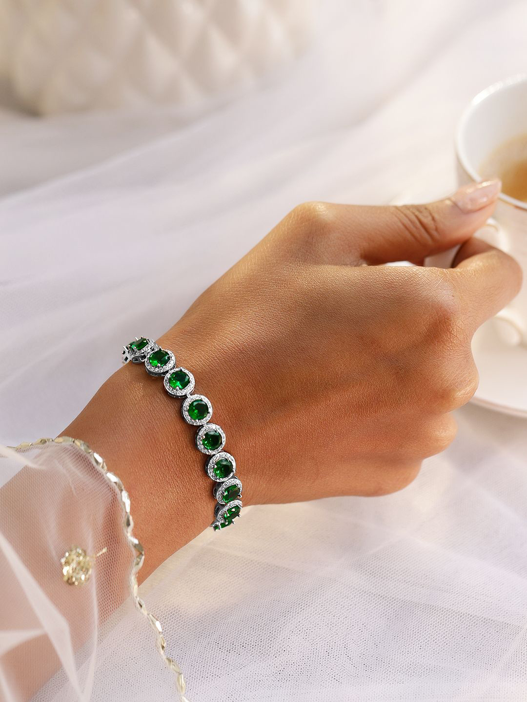 

Rubans Rhodium Plated Emerald Green & AAA Cubic Zirconia Studded Premium Tennis Bracelet, Silver