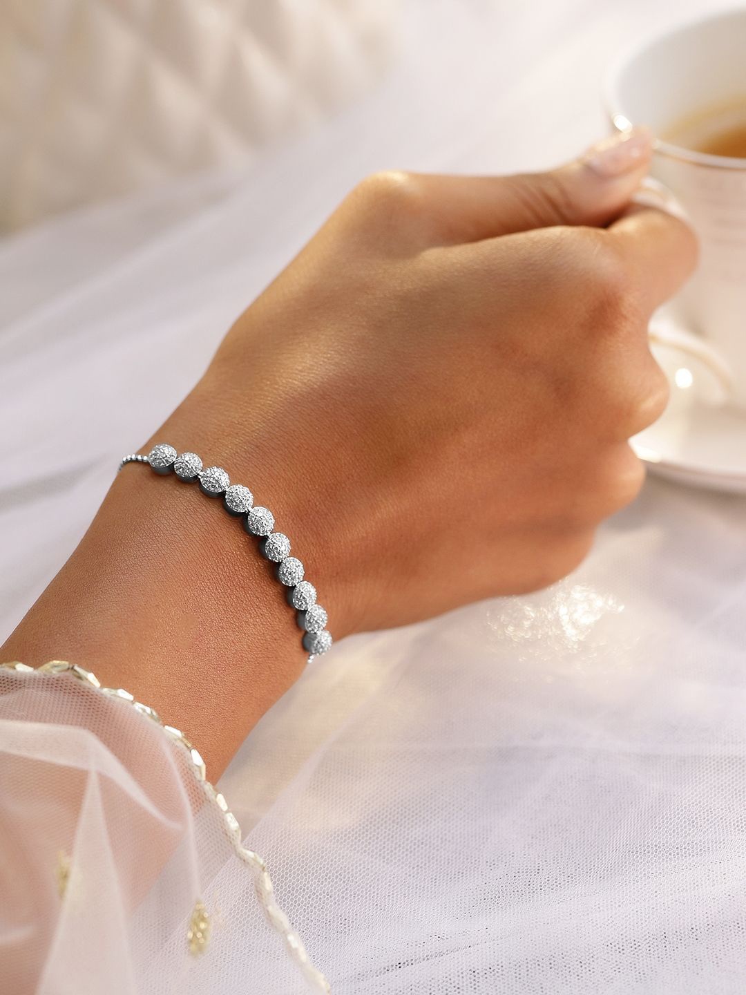 

Rubans Rhodium Plated Adjustable Pull Chain Cubic Zirconia Studded Bracelet, Silver