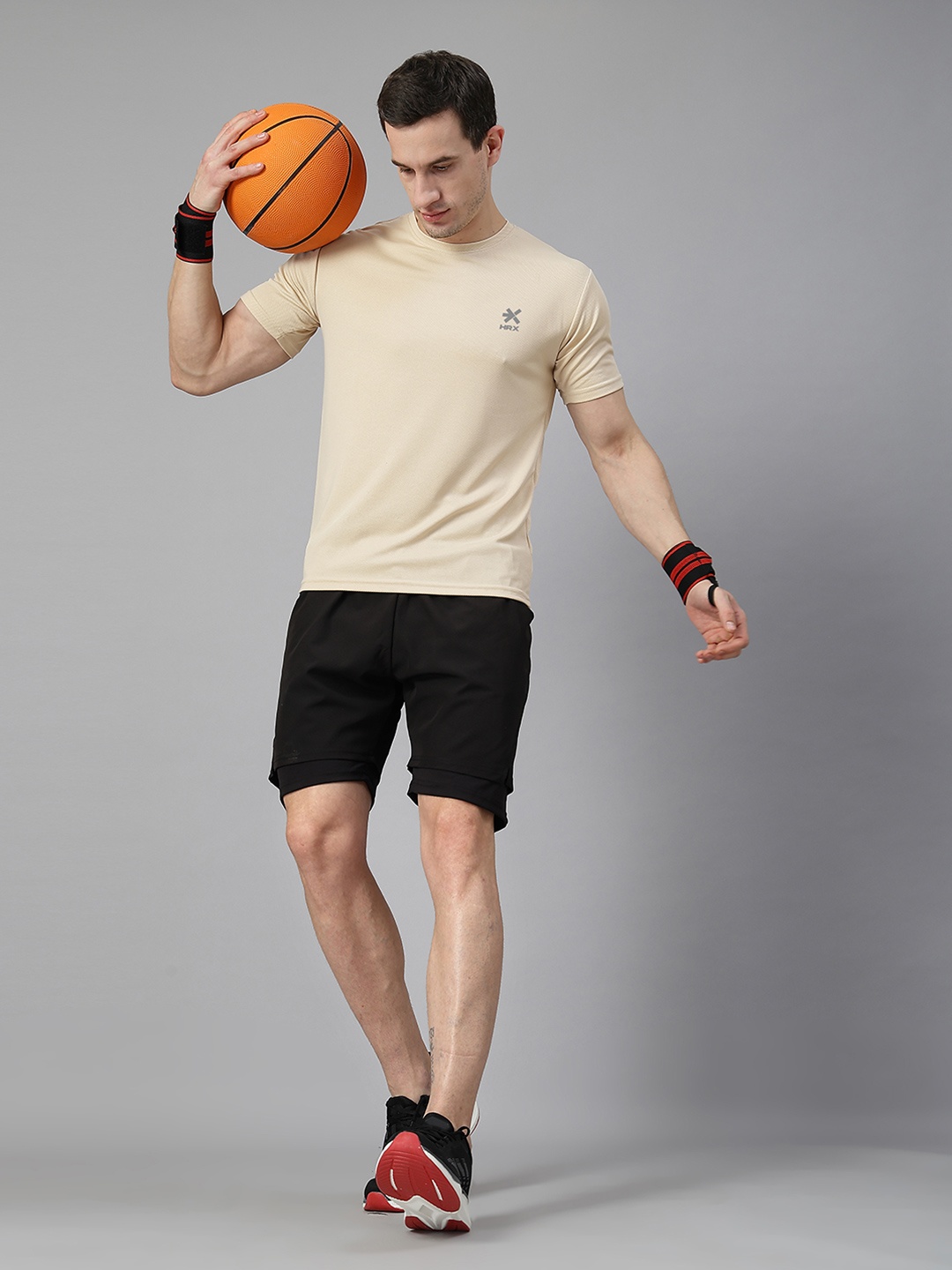 

HRX by Hrithik Roshan Men Solid Round Neck T-shirt, Beige