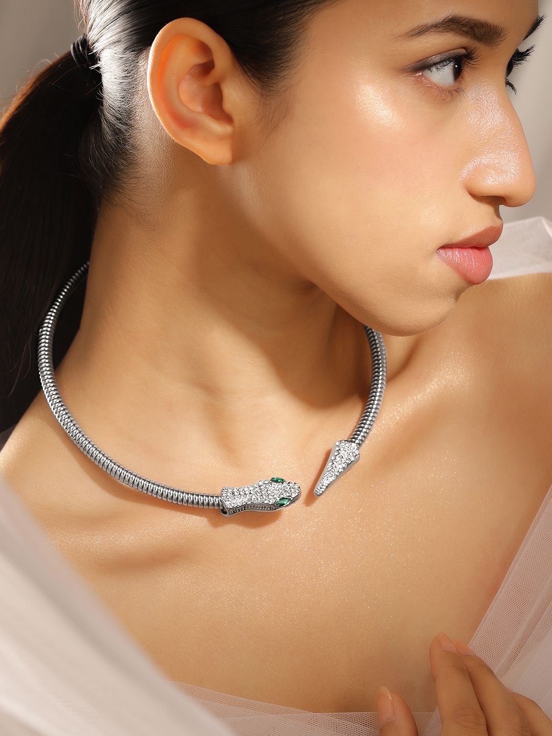 

Rubans Rhodium Plated Demi Fine Snake Motif Statement Choker with White & Emerald Stones, Silver