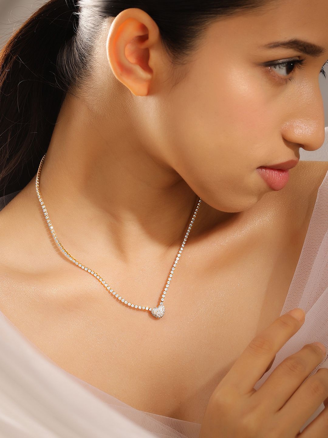 

Rubans 22KT Gold Plated Crystal & Cubic Zirconia Studded Timeless Heart Necklace
