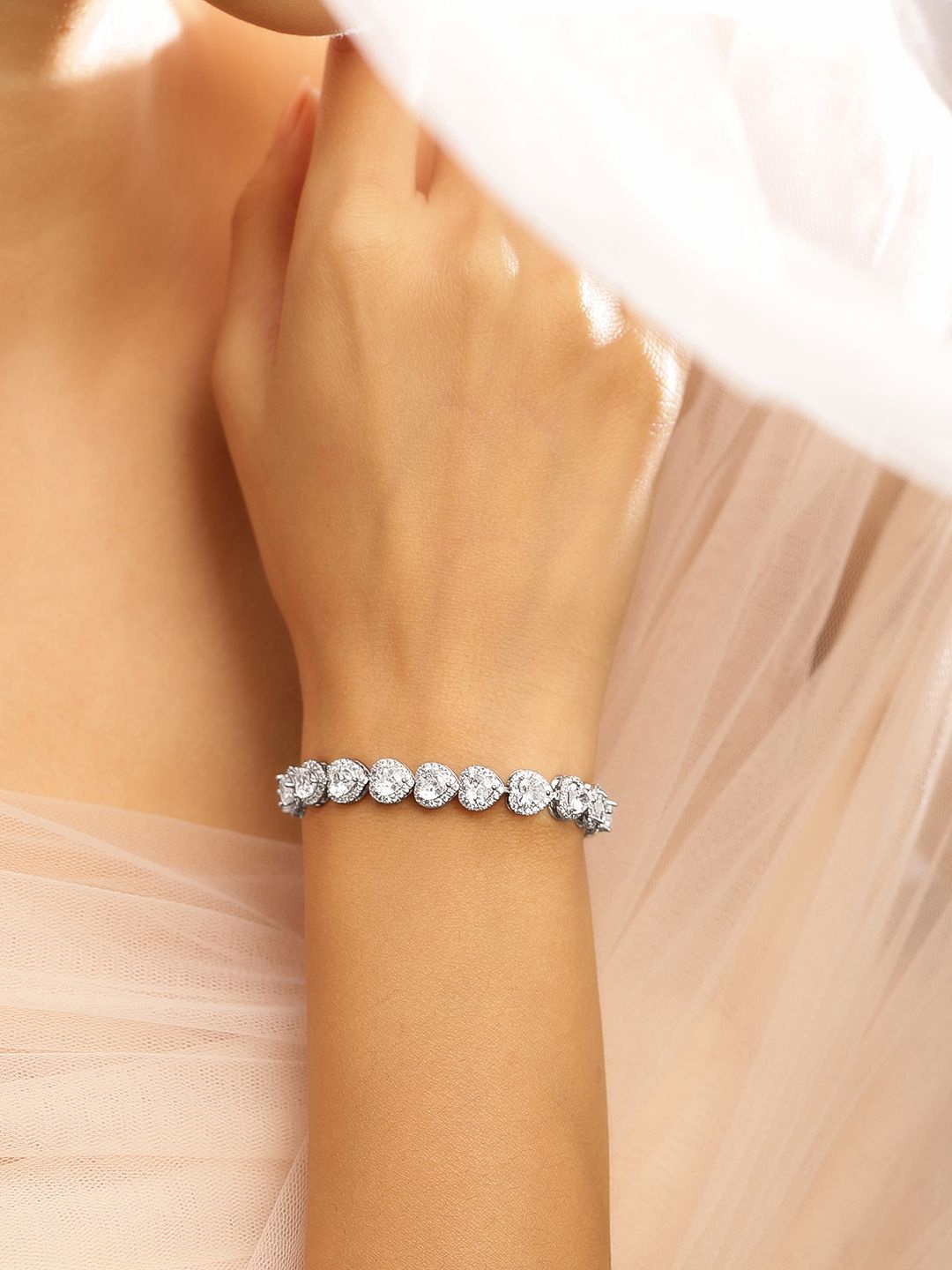 

Rubans Rhodium Plated AAA Cubic Zirconia Heart Tennis Bracelet & Design, Silver