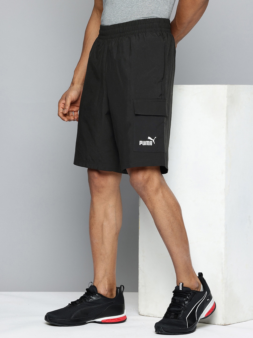 

Puma Men Brand Logo Printed Outdoor Cargo Shorts, Black