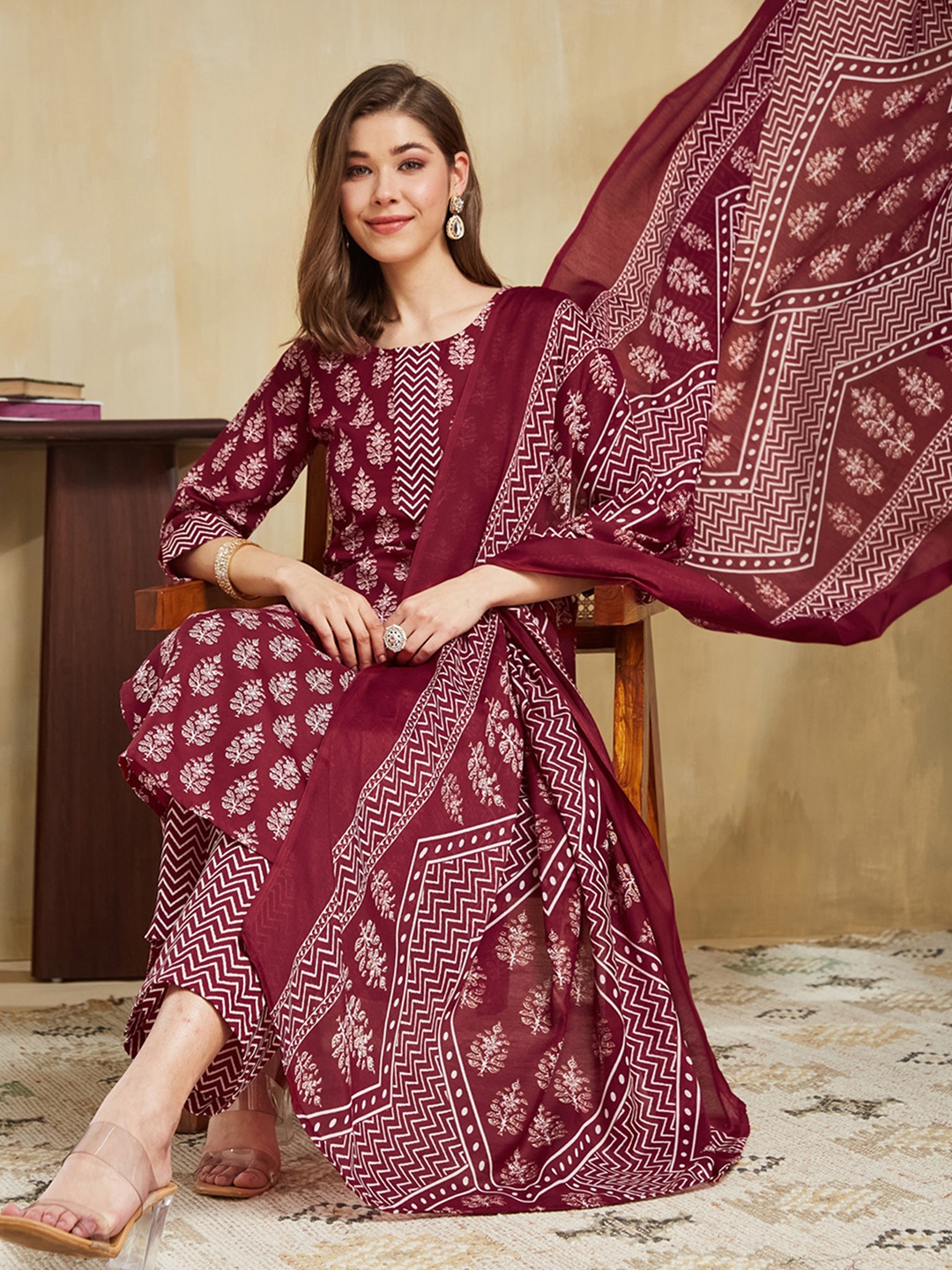 

SKYLEE Floral Printed Round Neck Straight Kurta With Trousers And Dupatta, Maroon
