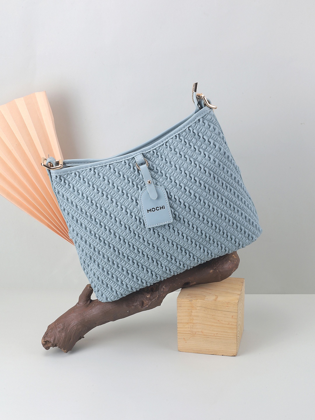 

Mochi Women Textured Structured Sling Bag, Blue