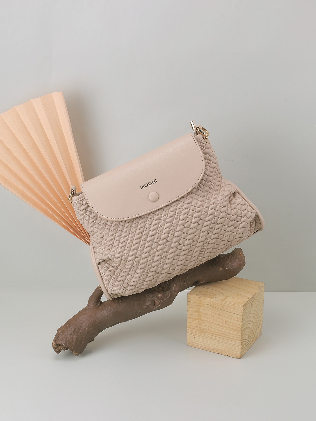 

Mochi Women Textured Sling Bag, Beige