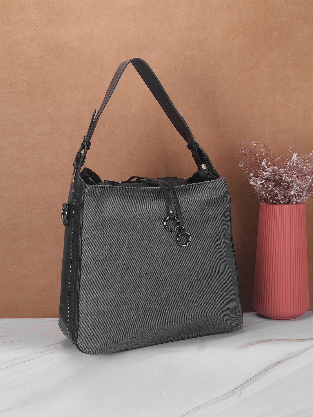 

Mochi Women Solid Structured Handheld Bag, Black