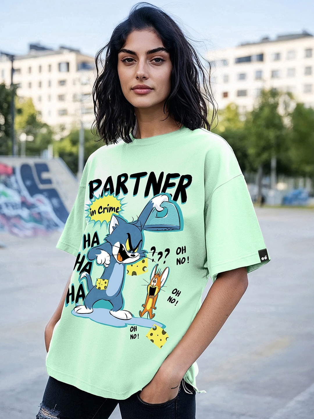 

Bewakoof Women Tom & Jerry Graphic Printed Round Neck Cotton Oversized T-shirt, Green
